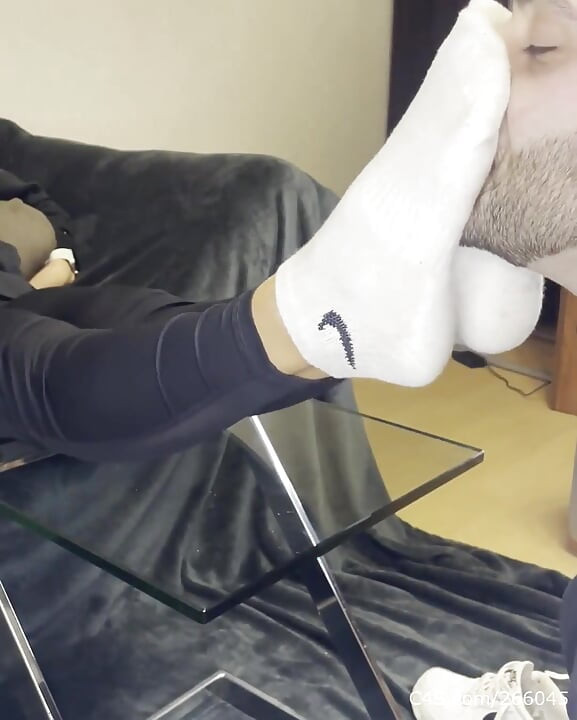 Dirty White Sneaker Worship - Smelly Socks in Face with Valeria Night (front View)
