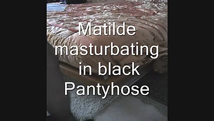 Matilde masturbating in black pantyhose