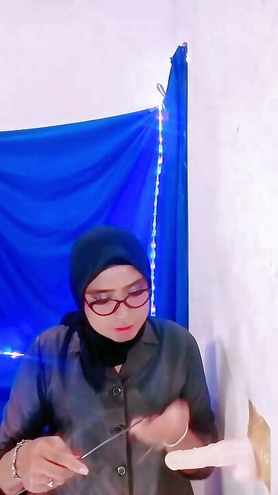 Hijab Teacher Checks and Disciplines Student's Cock