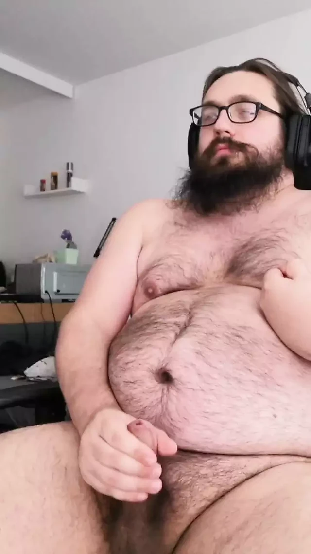 Fat bear masturbates and cums on himself