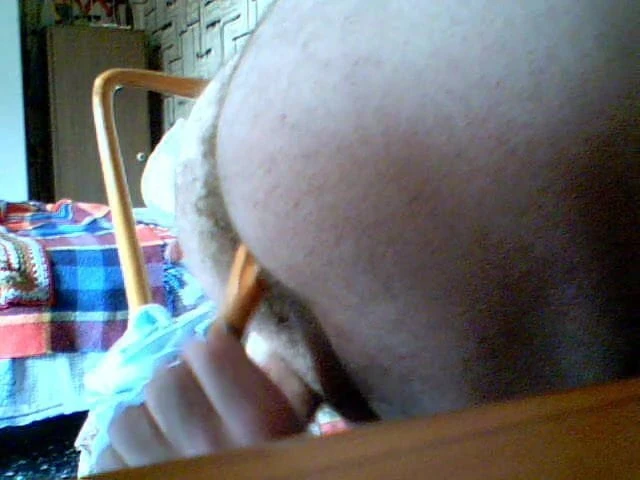 Hairy guy pleasures himself with a screwdriver in his ass