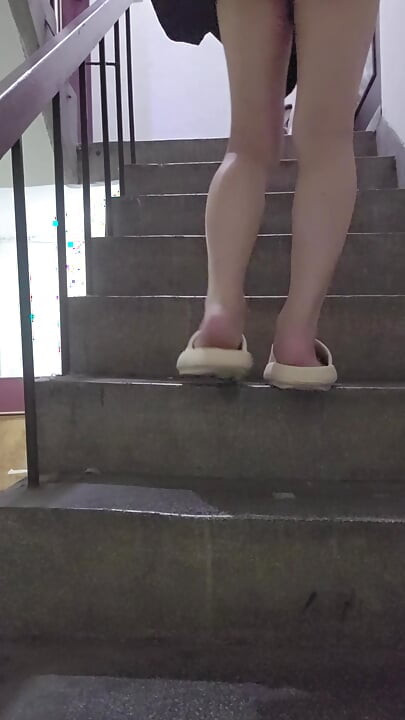 Shemale Ting xuan masturbates with a vibrator inserted in the stairwell.