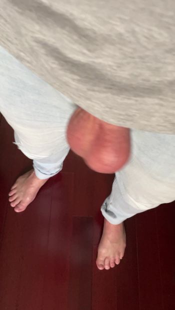 Barefoot in jeans showing my balls.