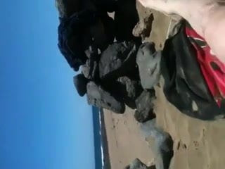 wanking on public beach