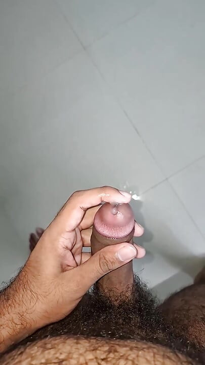 Hot hairy indian college guy strips, fingers ass hole, jerks his dick, moans and cums in his hostel room
