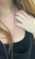 Hot ginger shows her tits