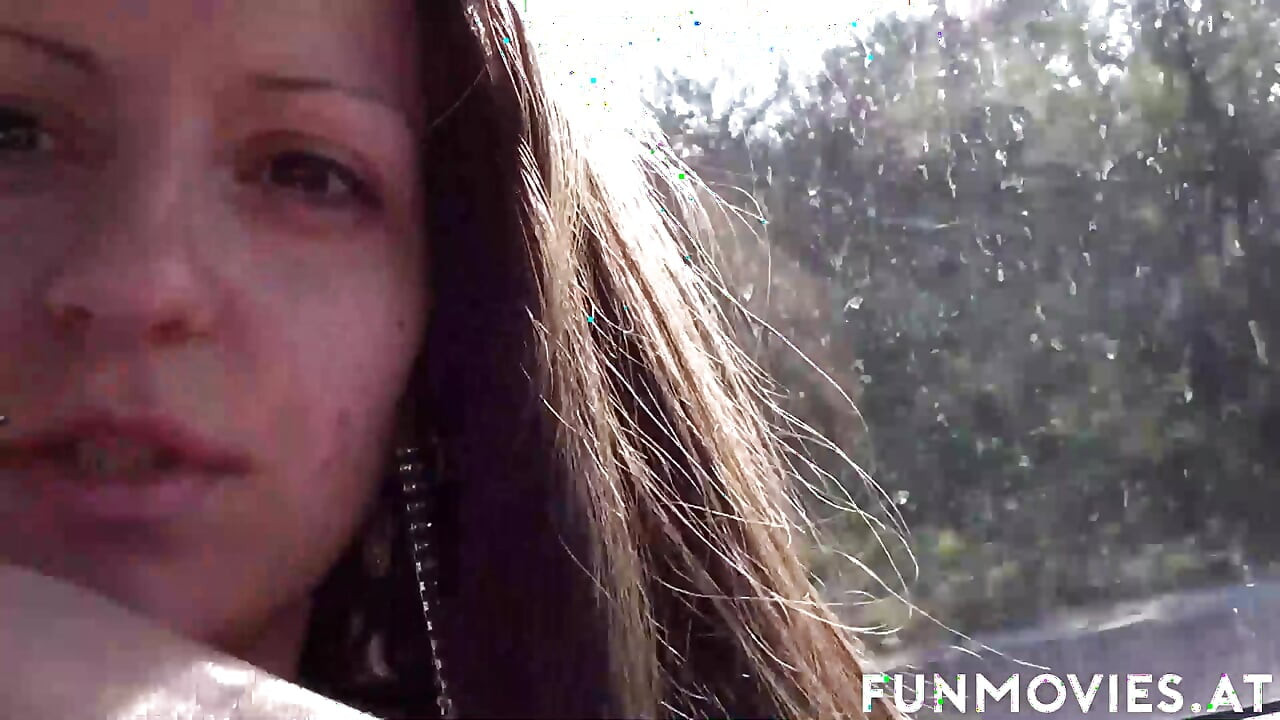 MILF plays with cock in the car