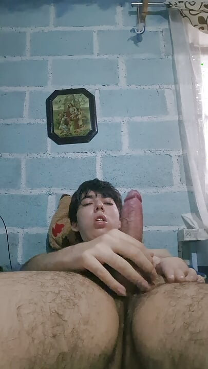 Horny young man masturbates alone and naked