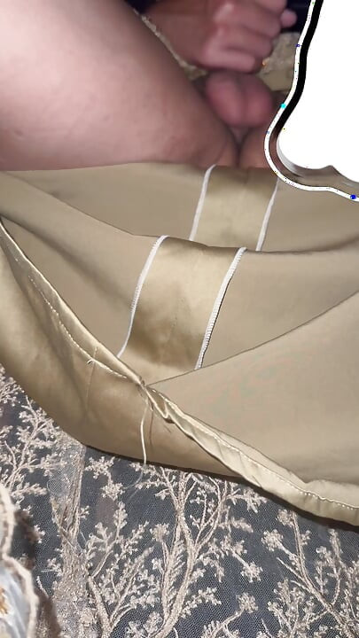 cross dresser cum wearing satin gown