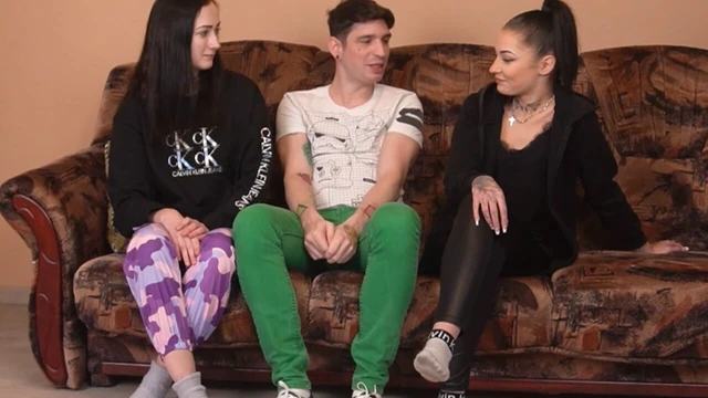 A strip game between a group of two girls and one lucky guy acting as the judge