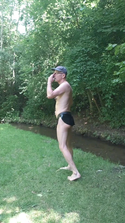 The slave shows a strip as a street hooker and takes off his sexy shorts.