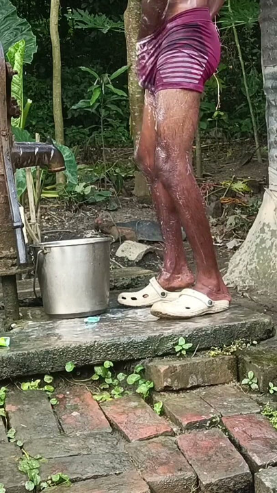 Black mature man bath in desi style. Showing big dick. | Clip 1