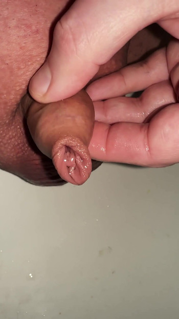 Memorable moment from "play with the foreskin of my micro cock while peeing"
