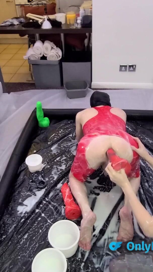 Playing with slime lube and big dildos in the paddling pool. | Clip 1