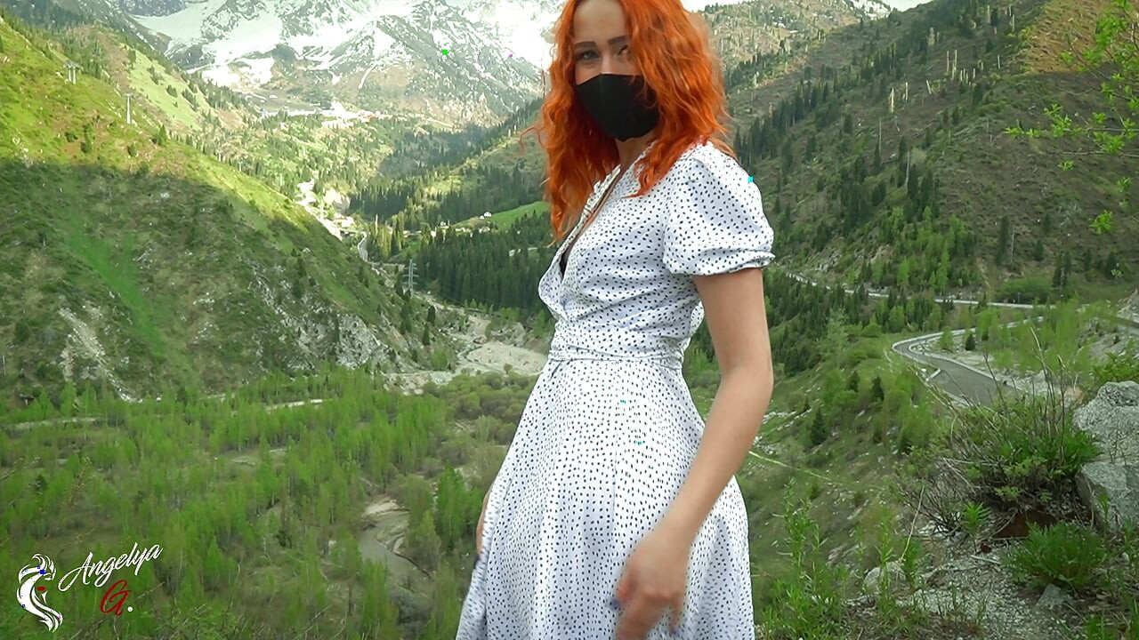 hot beauty against the backdrop of mountains