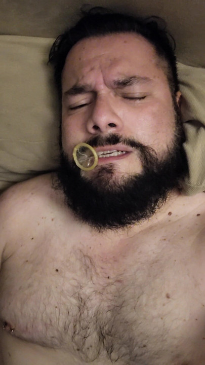 MASTURBATING WITH A CONDOM IN MY MOUTH