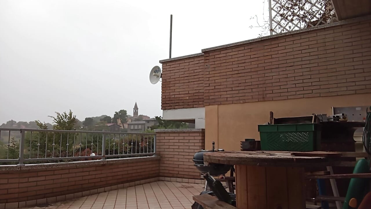 On the terrace, in the rain