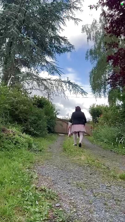 Dressed in a pink polka dot skirt for a party