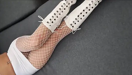 Perfect-assed MILF in High-heeled Boots and Fishnet Stockings