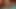 Selena's naked posing in a warm light