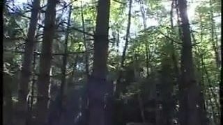 French girl with 2 men in forest