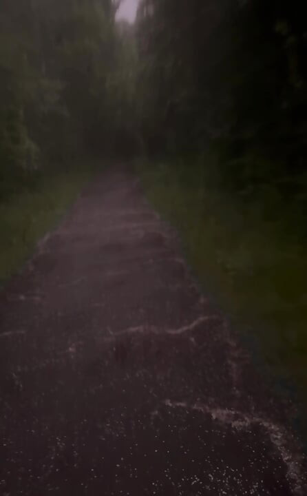 Long naked barefoot walk from car to a welcome to my town sign