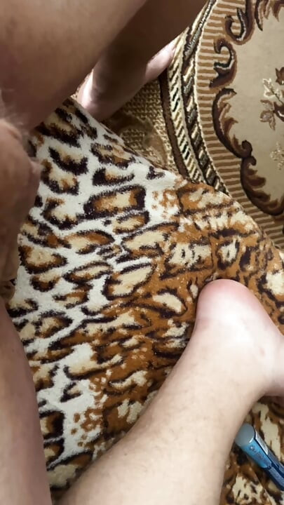 Fat man lying on the couch shows his ass and cums without hands, a lot of cum, cum, uncircumcised penis