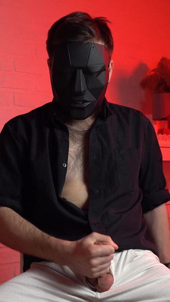Thrilling moment from "Masked handsome man Noel Dero watches kinky porn and jerks off. Loud moans and orgasm of a young guy."