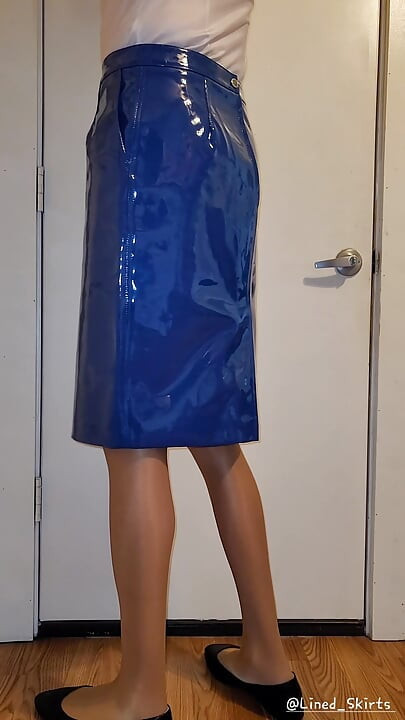 Showing off my blue PVC skirt.