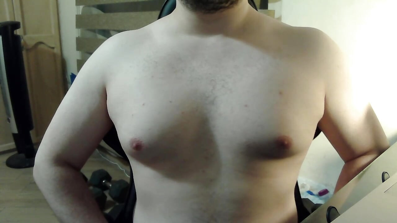 Flexing and bouncing pecs on cam