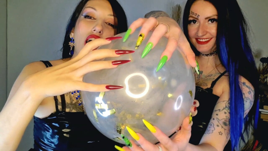 Fetish of inflatable balloons. Fetish of long sharp nails from two Dominatrixes.