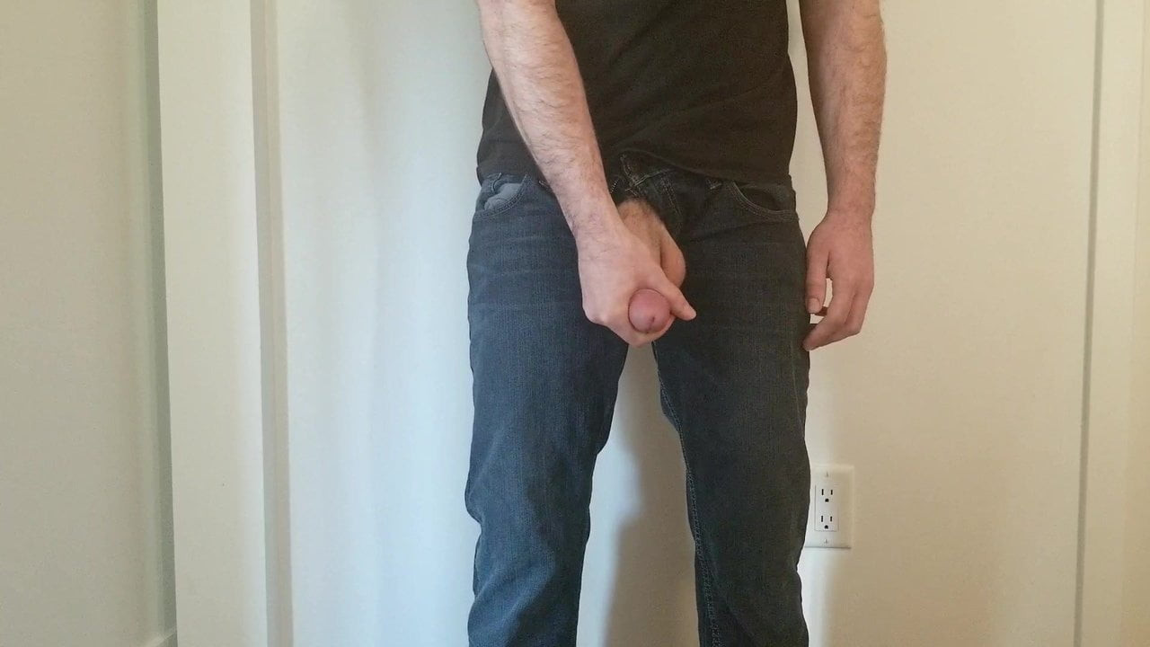 Teasing my cock and balls in jeans