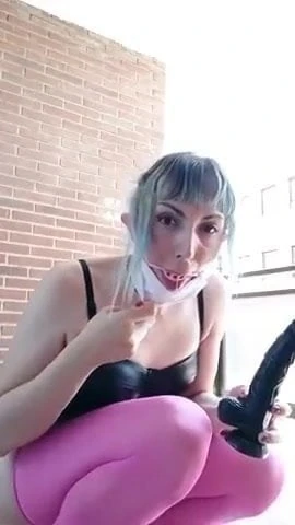 Crossdresser Fucks herself with a Dildo on the balcony