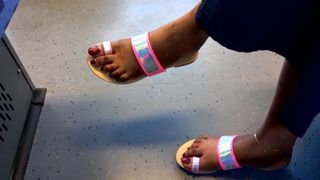 black mature feet with long red toenails and feet show