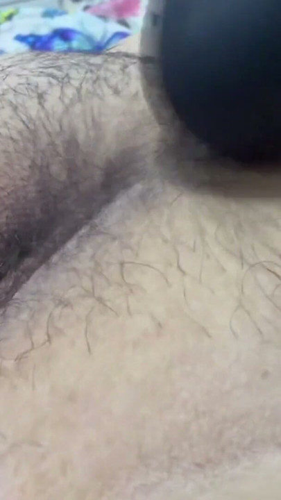 Sexy mom with her vibrator on her huge hairy pussy | Clip 1