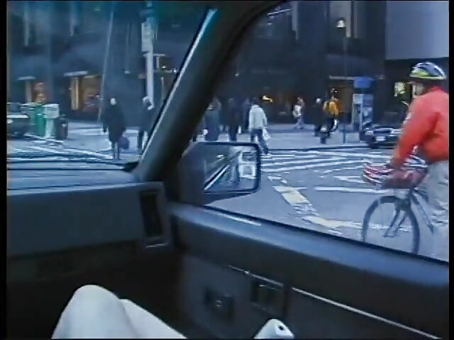Commuter redhead carpools with creep who debases her in car in city traffic