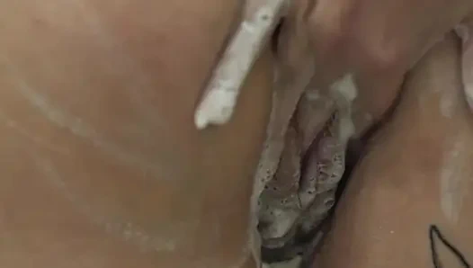 short hair tattooed girl tke a shower and masturbate