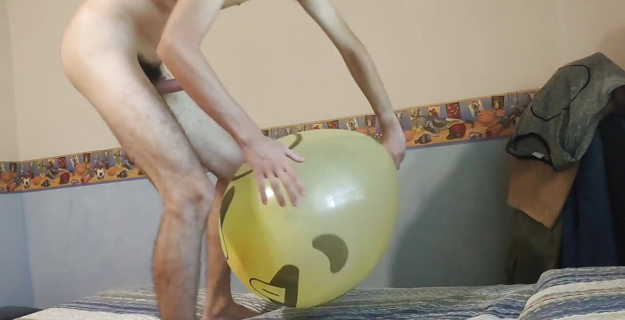 Blowing up a Huge Smiley Balloon While Jerking off