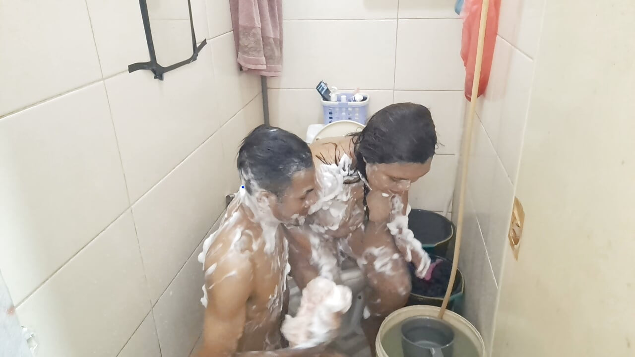 A Woman Who Takes A Shower In A Bathtub
