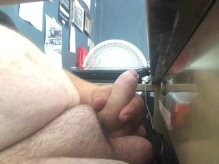 Playing with my uncut cock at my desk at work Part 1