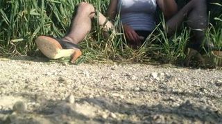 Crossdresser wanking in a wheat field