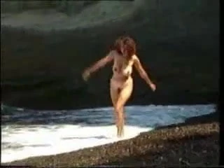 Big tits girl nude on the solitary beach