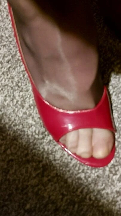 Male feet in sheer oiled stockings