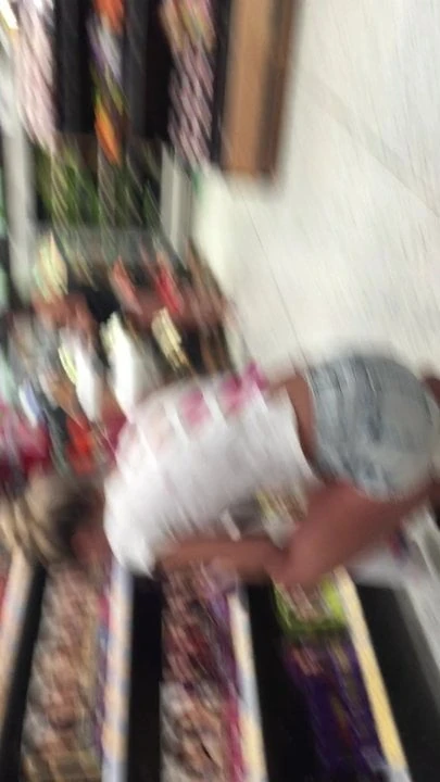 delicious woman with  thong in the supermarket
