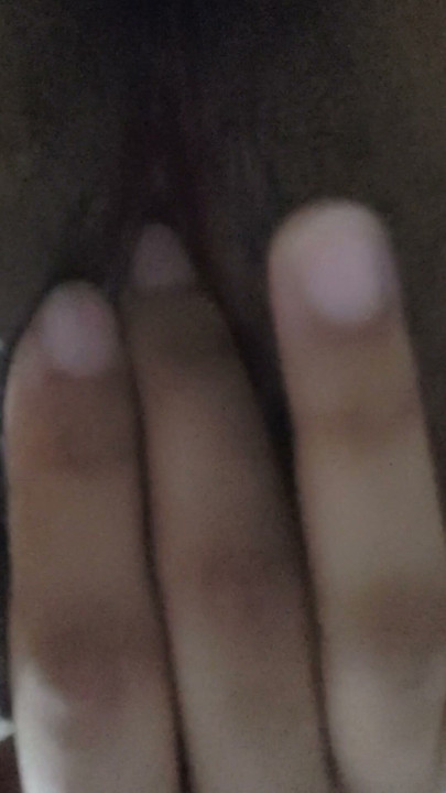 Nepali girl fingers her dark pussy