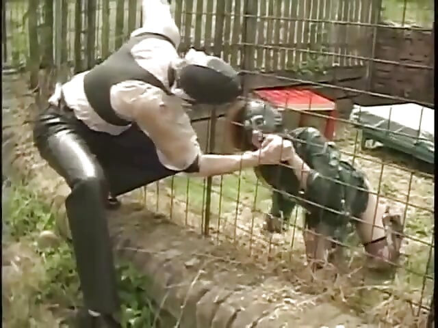 Slave in latex ass fucked in her cage