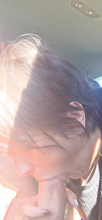 Mature sucking cock in the car