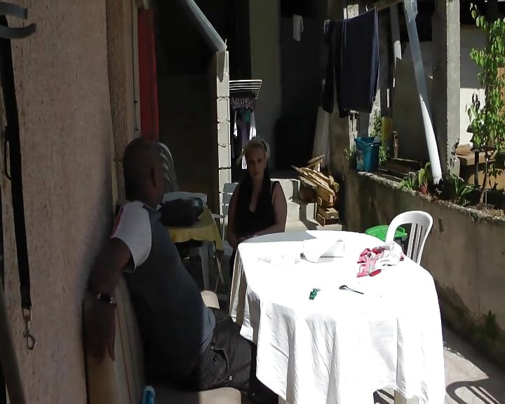 A Big Black Cock Is Fucking a Blonde MILF on the Terrace.