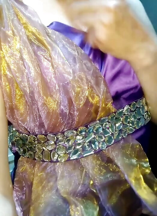Crossdresser masturbation wearing satin purple longgown