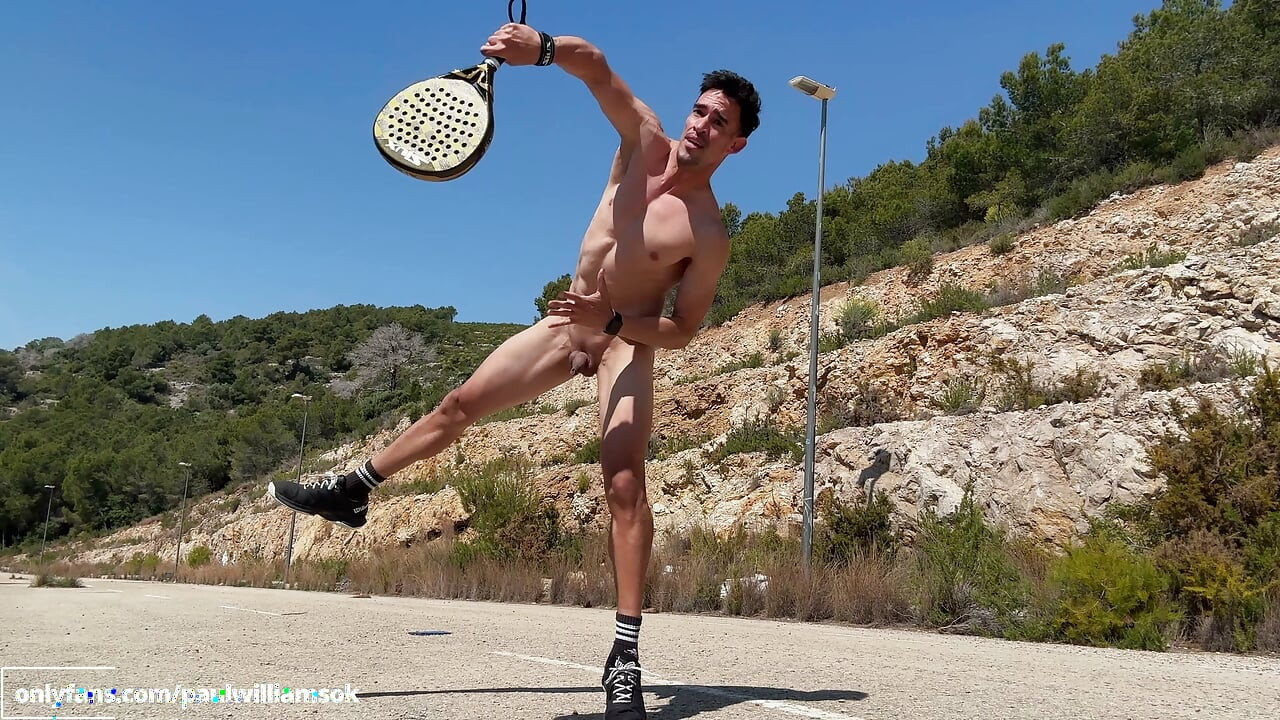 Fitness man training padel naked outdoor